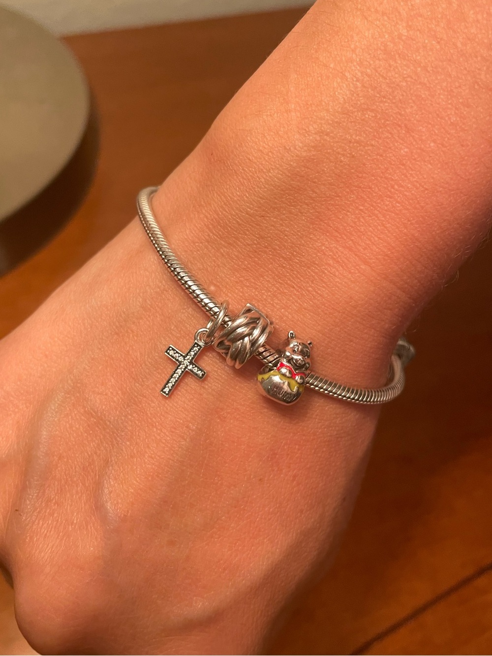 Pandora Silver Bracelet with Winnie the Pooh, Cross, & Braided Snap Charms